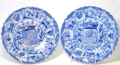 Lot 197 - A pair of Delft chargers with armorial and kraak style decoration