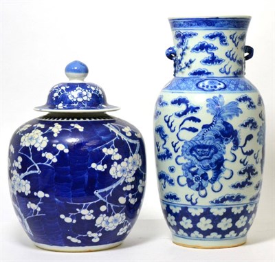 Lot 202 - A Chinese porcelain blue and white vase with Buddhist lions amongst clouds; and a blue and...