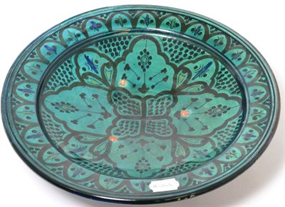 Lot 205 - An Iznik style shallow footed bowl, signed to base