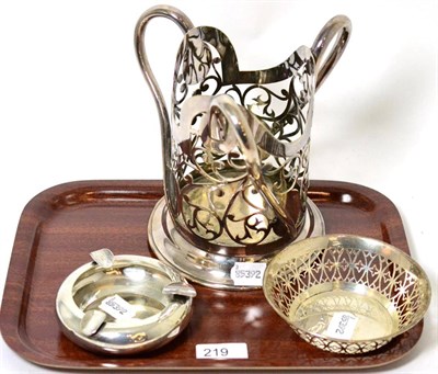 Lot 219 - A silver pierced basket, a silver ashtray and a plated siphon stand