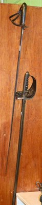 Lot 227 - A 19th century naval sword together with an early 20th century example, a middle eastern copper...