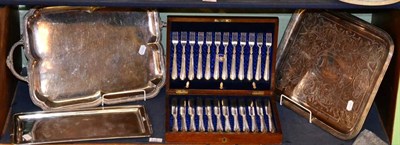 Lot 239 - A cased set of plated knives and forks and three assorted plated trays