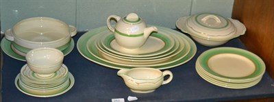 Lot 253 - A large assortment of Clarice Cliff green band pattern wares, examples produced by Newport Pottery