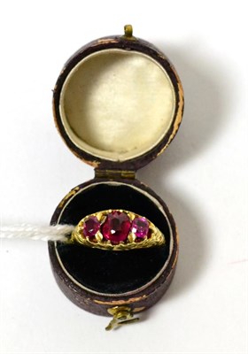 Lot 270 - A Victorian three stone ruby ring
