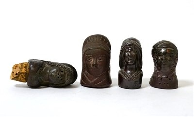 Lot 300 - Four stoneware 'character' bottle stoppers