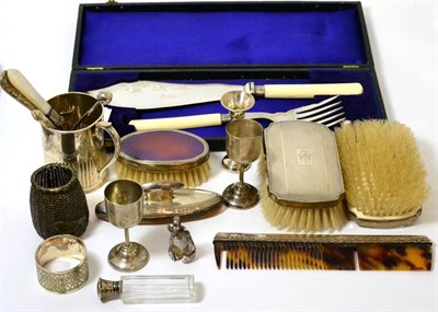 Lot 303 - Assorted silver to include a pair of brushes; a comb, bear; scent bottle etc and assorted...