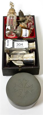 Lot 304 - A silver plated travelling communion set and various silver bottle stoppers