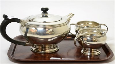 Lot 345 - A Hukin & Heath three piece silver tea set