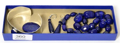 Lot 360 - A lapis lazuli necklace, a pair of lapis lazuli drop earrings, a lapis lazuli brooch and a...