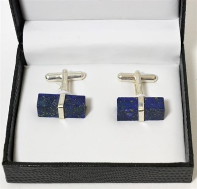 Lot 361 - A cased pair of lapis lazuli cufflinks mounted in white metal stamped '925'