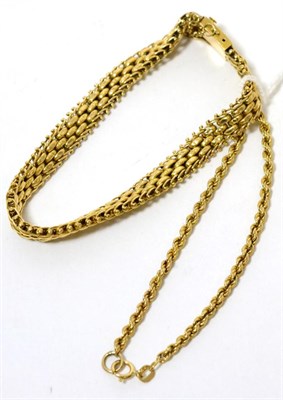 Lot 363 - A 9ct gold fancy link bracelet and a 9ct gold rope chain bracelet (2)