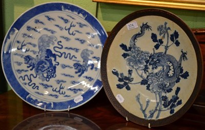 Lot 374 - A Chinese blue and white charger featuring a dragon within a brown etched border and another...