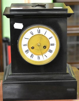 Lot 386 - A Victorian black slate striking mantle clock, retailed by Edward & Sons, Paris, striking on a gong