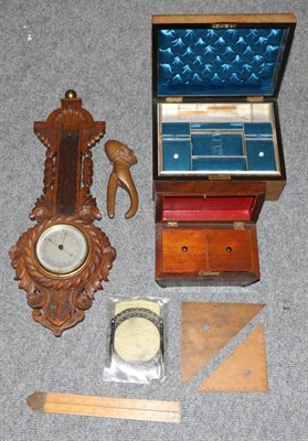 Lot 1056 - A carved oak barometer, rules, tea caddy, Victorian box etc