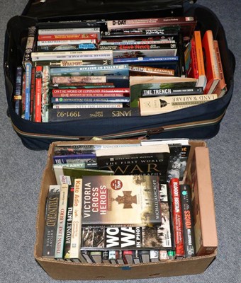 Lot 1090 - A quantity of military reference and history books in a suitcase and two boxes