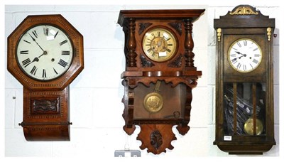 Lot 1102 - A Victorian drop dial wall clock with parquetry inlay, together with two early 20th century...