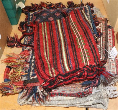 Lot 1133 - Middle Eastern Kilim rug and four salt bags (5)