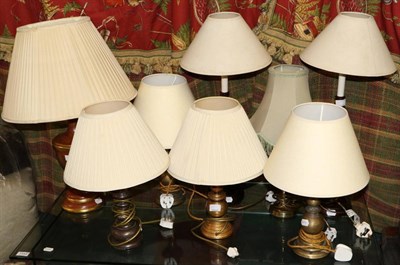 Lot 1153 - A group of eight modern table lamps and a modern glass coffee table