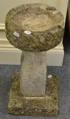 Lot 1177 - A carved stone bird bath