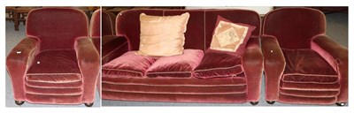 Lot 1195 - A three piece suite in red velvet, circa 1950