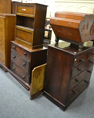 Lot 1199 - A Victorian mahogany four height chest of drawers, a three height chest of drawers and an oak...