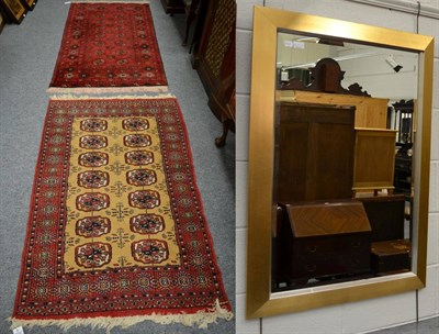 Lot 1216 - A Tekke rug, North Afghanistan, the crimson field with columns of quartered guls enclosed by...