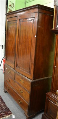 Lot 1234 - A George III mahogany linen press