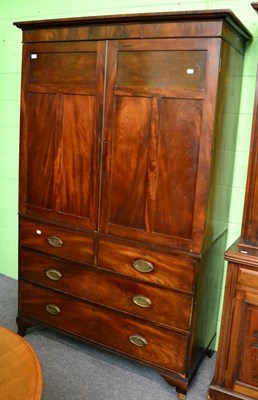 Lot 1241 - A 19th century mahogany linen press