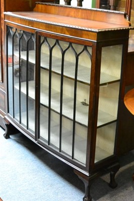 Lot 1254 - A reproduction display cabinet