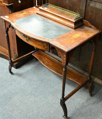 Lot 1257 - An inlaid rosewood writing desk