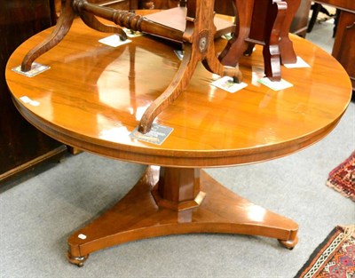 Lot 1258 - A Regency circular tilt top pedestal table on a triform platform base