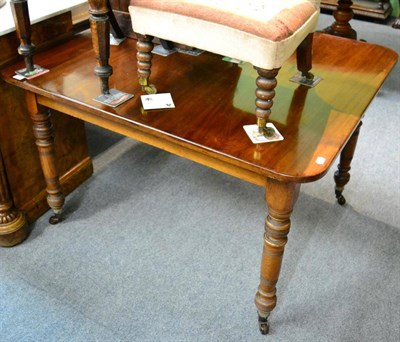 Lot 1266 - A Waring & Gillow dining table