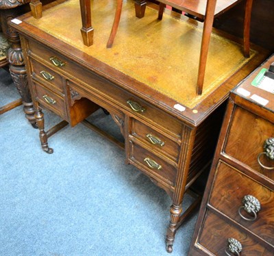 Lot 1280 - A leather inset mahogany ladies kneehole writing desk