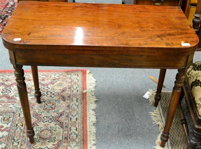 Lot 1288 - A 19th century mahogany fold over tea table