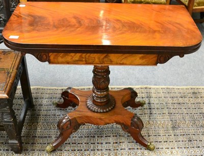 Lot 1291 - A 19th century fold over tea table