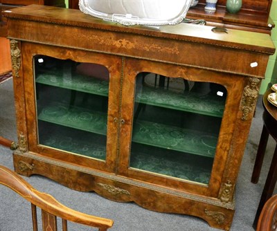 Lot 1300 - A 19th century inlaid walnut glazed bookcase