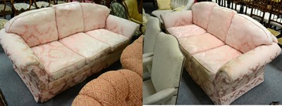 Lot 1309 - Pair of pink upholstered sofas