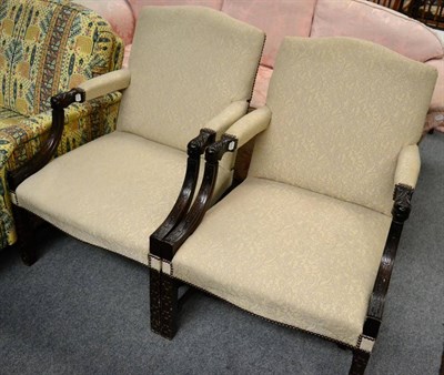 Lot 1311 - A pair of Gainsborough style open armchairs