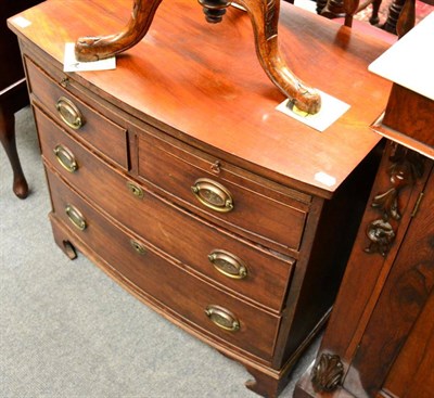 Lot 1330 - A small mahogany three height bow-fronted chest of drawers