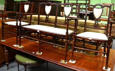 Lot 1337 - An Edwardian three piece salon suite with pierced plate