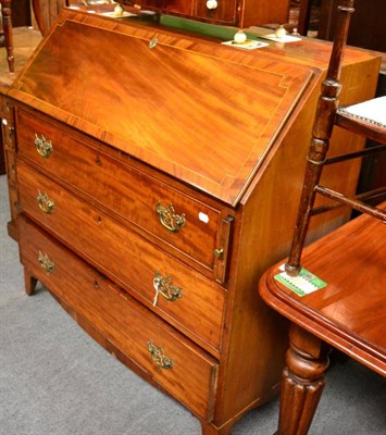 Lot 1338 - An inlaid mahogany bureau