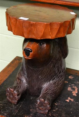 Lot 1352 - A black forest style carved wooden stool in the form of a seated bear