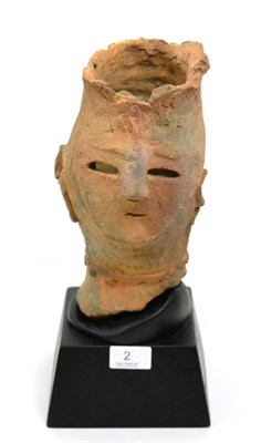 Lot 2 - Head of Haniwa, ritual pottery head from Saitama, Japan, Kofun style, circa 3rd-6th century, raised