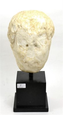 Lot 7 - A larger than lifesize Roman marble head, circa 200AD-300AD, modelled partly in the round,...
