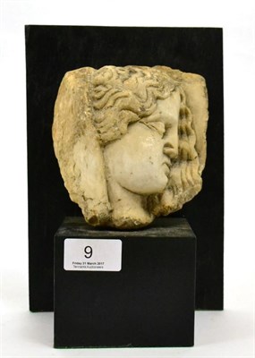 Lot 9 - A Roman style carved marble head of a female, in deep relief, possibly from a frieze, mounted...