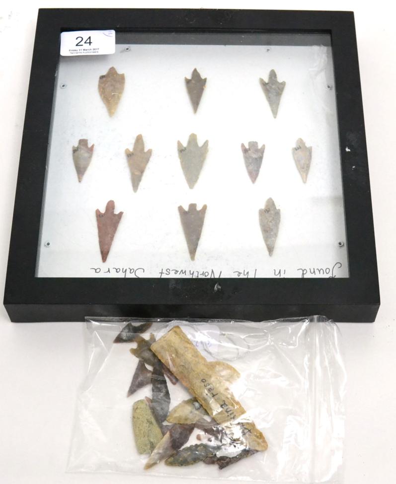 Lot 24 - A collection of African Neolithic carved stone arrowheads and tools, circa 2000-3000 BCE , to...