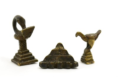 Lot 37 - An African bronze 'Sankofa' (translation 'go back and fetch it') bird gold weight,  Ashanti or...