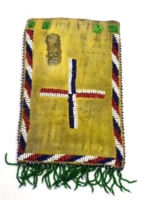 Lot 52 - A Native American/ First Nations Apache beaded leather bag, 1930's, hand crafted. 18cm high by 10cm