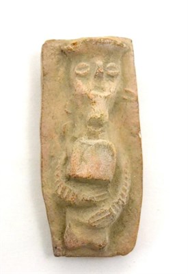 Lot 56 - A pottery bust, possibly ancient Syria, modelled in deep relief and holding a tablet over...
