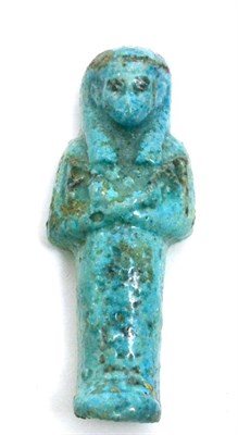 Lot 66 - An Egyptian bi colour blue faience ushabti, XXI-XXII dynasty, circa 500 BCE-1000BCE, decorated with